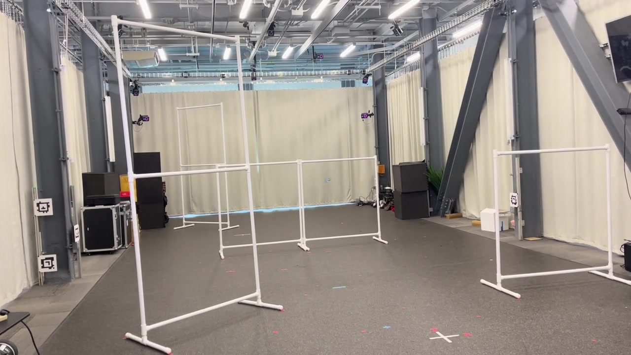 A real Crazyflie drone flying through the indoor racing course